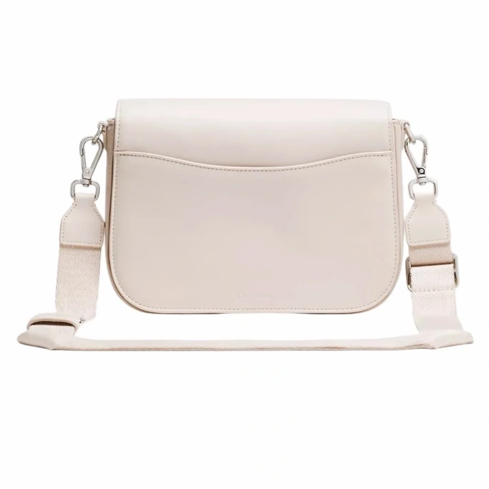 Lululemon Leather Alternative Crossbody Bag 1.5L Cashew and Silver MSRP $198 NWT - Picture 2 of 8